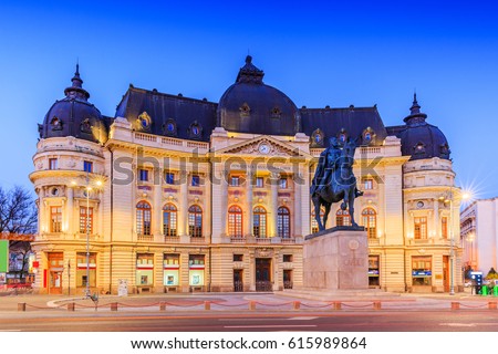 Bucharest, Romania. The Central University Library and statue of King Carol I of Romania
