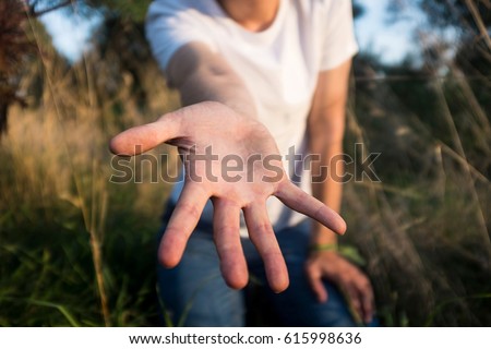 Helping Hand Reaching Out Royalty-Free Stock Photo #615998636