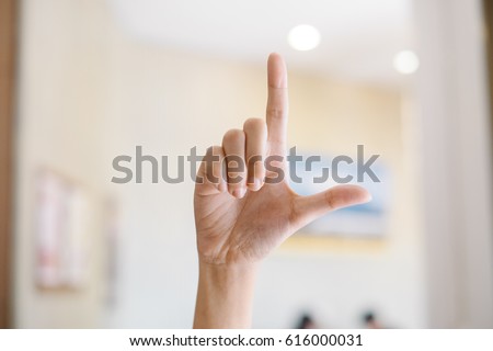 Alphabet with hands The Letter L