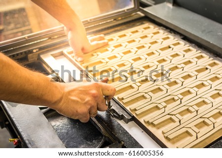 Rotary Die Cutting Royalty-Free Stock Photo #616005356