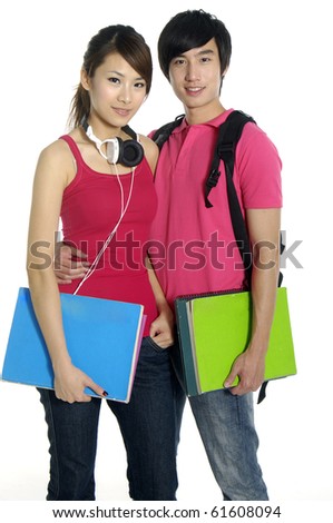 Couple standing with books and bags,