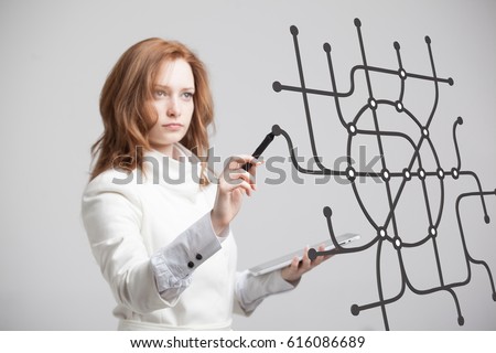 Woman specialist and urban planner working with the interactive subway map. Royalty-Free Stock Photo #616086689