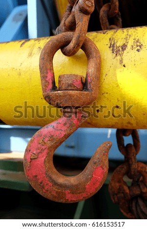 Rusty hook and chain.