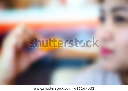 Picture blurred abstract background of fat woman eat food