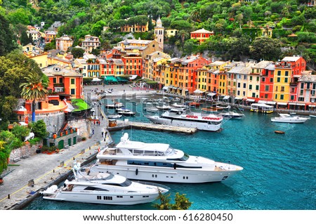 The beautiful Portofino with colorful houses and villas, luxury yachts and boats in little bay harbor. Liguria, Italy, Europe Royalty-Free Stock Photo #616280450