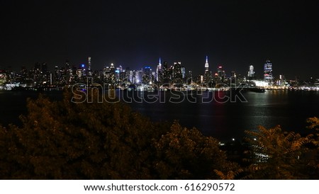  Manhattan beyond Hudson river by night