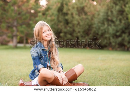 Pretty girl 14 years old posing on nature of summer Stock Photo by  ©olenka-2008 115734512