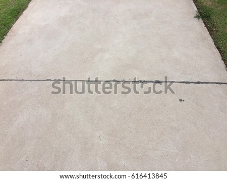 Floor texture for cement and green grass sidewalk background