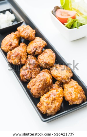 Fried chicken in black plate
