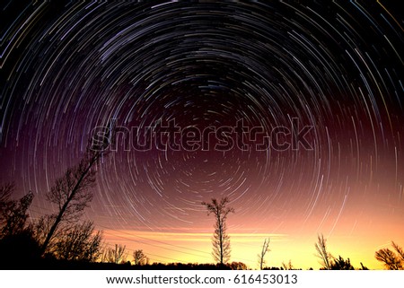 Cumulative time lapse of star trails in night sky