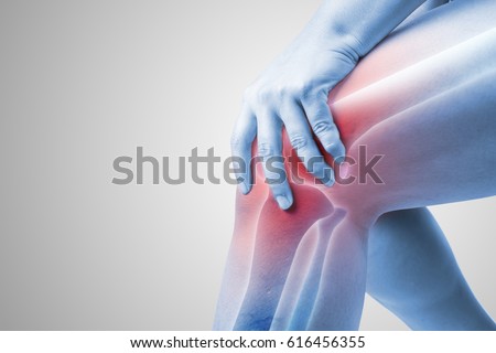 knee injury in humans .knee pain,joint pains people medical, mono tone highlight at knee Royalty-Free Stock Photo #616456355