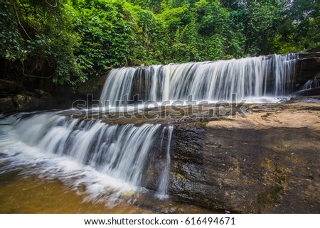 Small waterfalls in tropical forests in Thailand.
