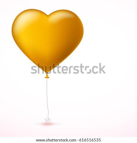 Bright yellow inflatable balloon in the shape of big heart with tape on white background. Greeting card for your friends, loved ones with a bouncy ball in form heart.