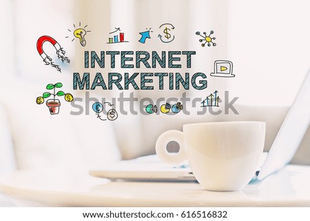 Internet Marketing concept with a cup of coffee and a laptop