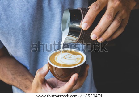 Coffee latte art by Barista