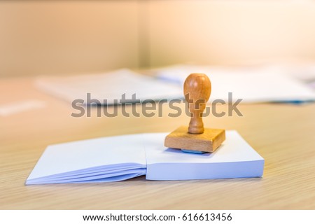 Wooden stamp to register documents