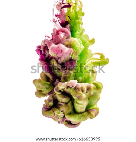 colorful ink isolated on white background. green purple drop swirling under water. Cloud of ink in water. 