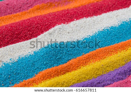 Background texture of colored sand closeup