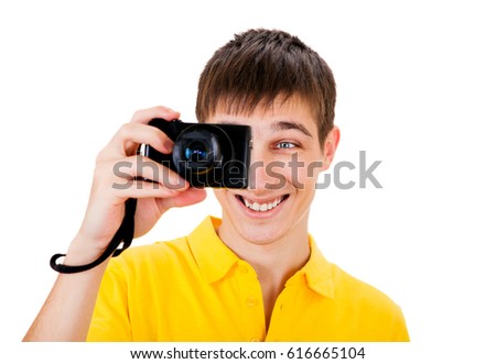 Cheerful Young Man with a Photo Camera Isolated on the White Background