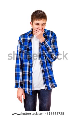 Young Man Yawning Isolated on the White Background