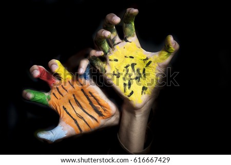 two aggressive and fearless  colored  hands.