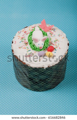 Homemade traditional Easter cake on a wooden background.