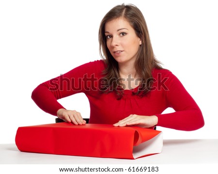 	Women wrapping gift box