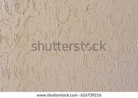 Texture of painted plaster wall relief inside, abstract background