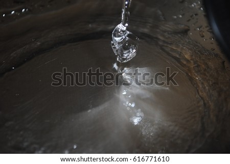 Water drop falling looks likes a diamond