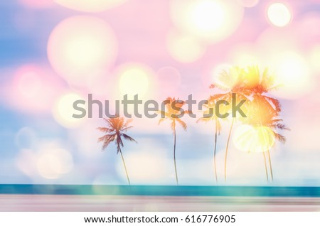 Copy space of tropical palm tree with sun light on blue sky and white cloud abstract background. Summer vacation and nature travel adventure concept. Vintage tone filter effect color style.