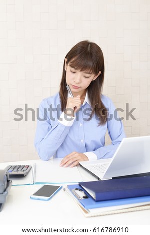 Working Asian business woman
