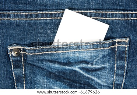 Blank card with copy space in a pocket of blue jeans.