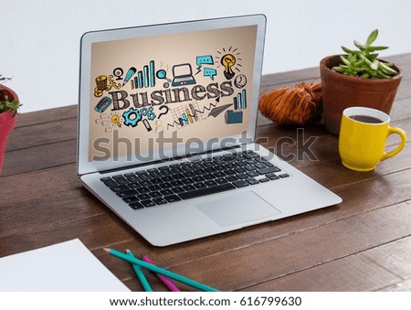 Digital composite of Computer on table showing blue and yellow business doodles against cream background