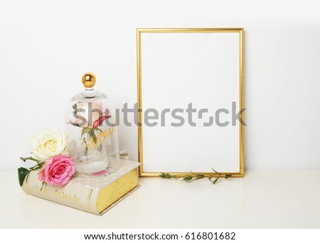 gold picture frame with decorations. Mock up for your photo or text Place your work, print art,shabby style, white background, pastel color book