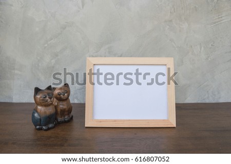 photo Frame  on a wooden on Gray wall background .