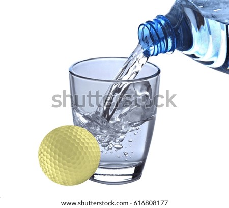 Water bottle with water glass and golf ball