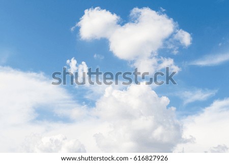 BLue sky and White cloud: clear blue sky with plain white cloud with space for text, Blue sky and cloud. Royalty-Free Stock Photo #616827926