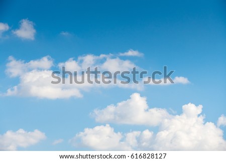 BLue sky and White cloud: clear blue sky with plain white cloud with space for text, Blue sky and cloud. Royalty-Free Stock Photo #616828127