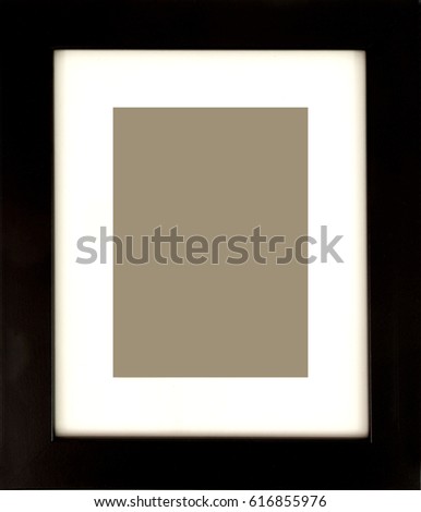 Black picture frame with white matte and empty space for photo.