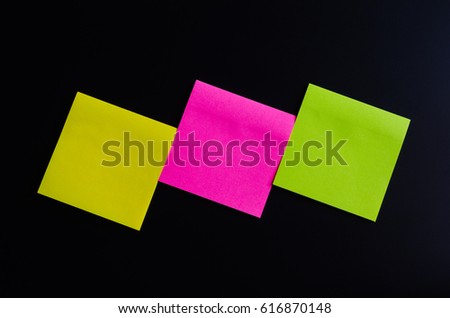 blank sticky note or post note colorful on blackboard.