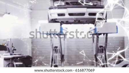 Digital composite of Car on stand and white network