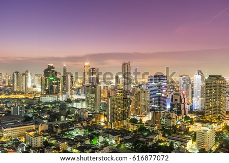 cityscape in the sunset at bangkok, thailand. this picture takes on the top of tower, restaurant. customer can use this picture for background, business presentation or anything