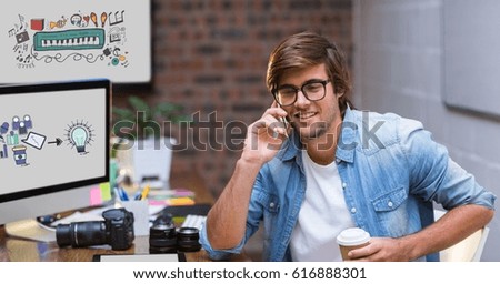 Digital composite of Creative businessman using smart phone by screens displaying icons
