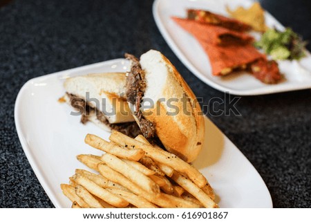 top view of gourmet french dip roasted beef sandwich 