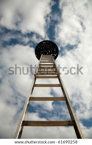 stairway to heaven, or Jacobs Ladder. An extension ladder extends into a hole in the sky allowing access to heaven or the 4th or 5th dimension or other worldly locations Royalty-Free Stock Photo #61690258