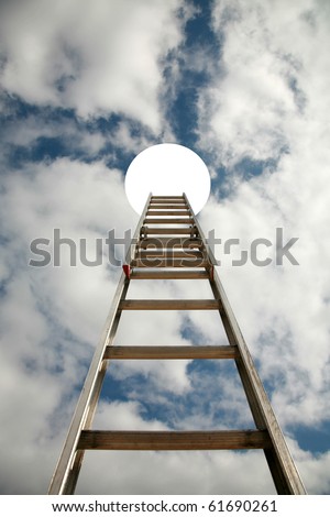 stairway to heaven, or Jacobs Ladder. An extension ladder extends into a hole in the sky allowing access to heaven or the 4th or 5th dimension or other worldly locations Royalty-Free Stock Photo #61690261