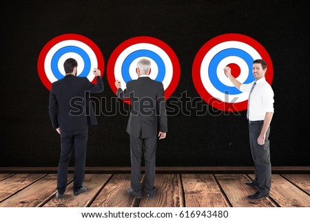 Digital composite of Digital composite image of business people setting targets