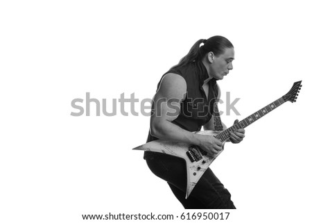 Black and white portrait of a male musician with long hair and an electric guitar in his hands on a white background