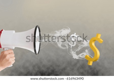 Digital composite of Hand holding megaphone with dollar signs and smoke coming out