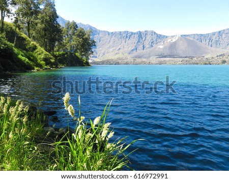 Blue lake in the crater of the volcano Rinjani, Indonesia